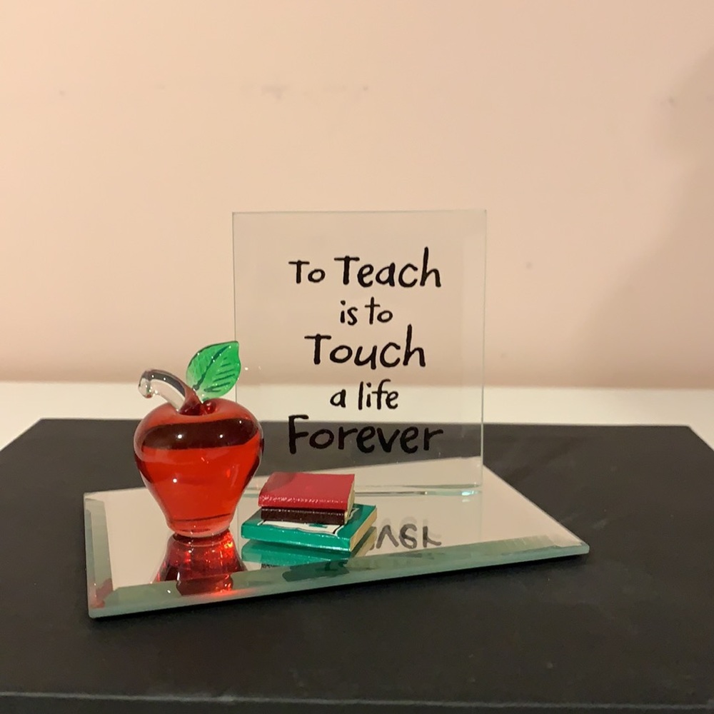 Teacher’s glass desk ornament.